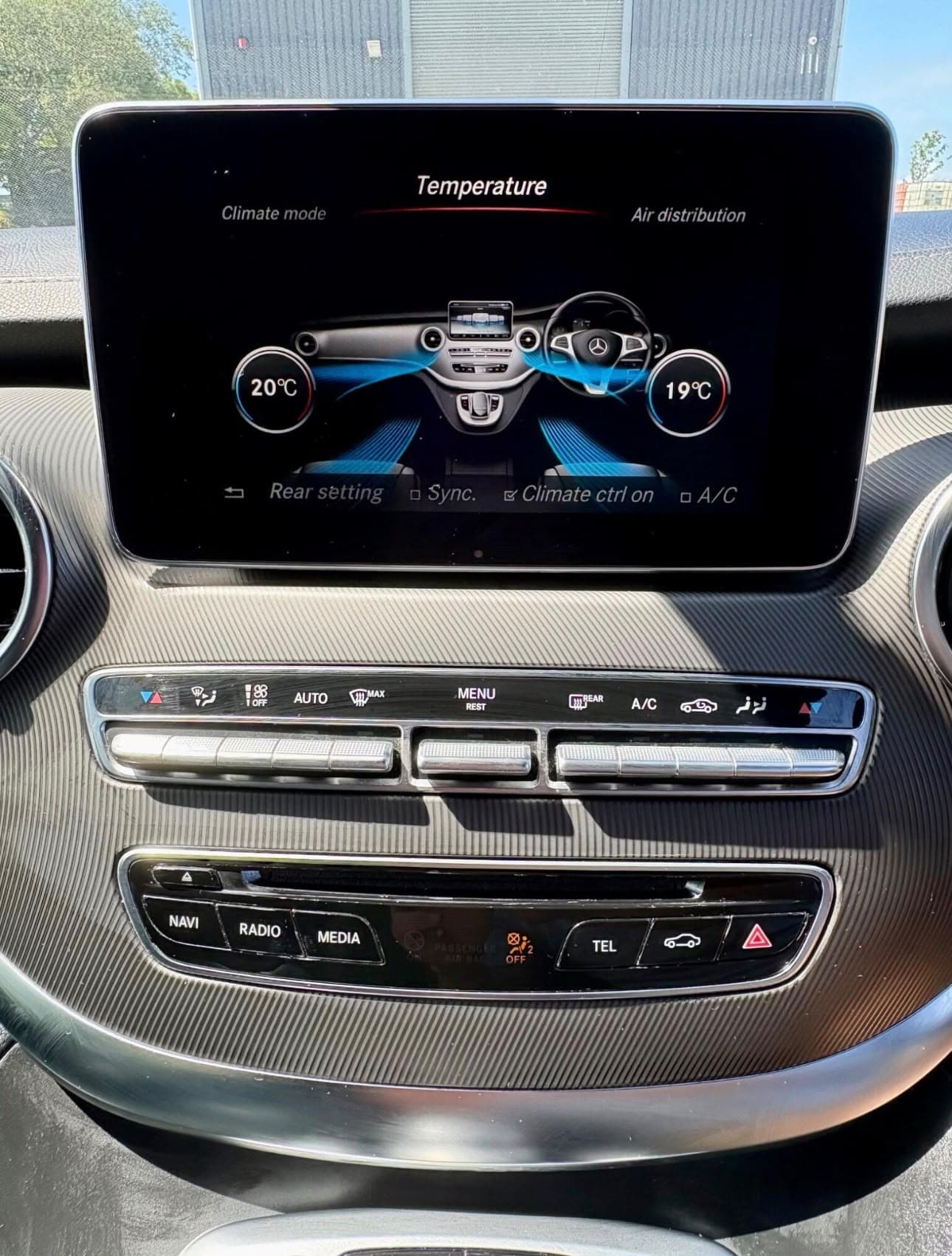 Close-up of the dashboard display and climate controls