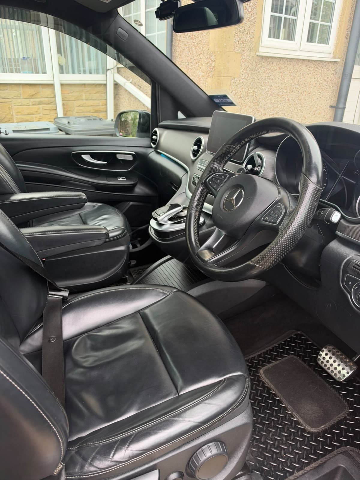 Driver seating, steering wheel and cabin details